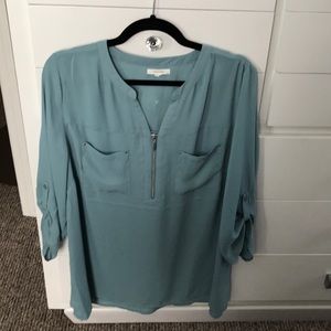 Maurice’s teal top with zipper detail